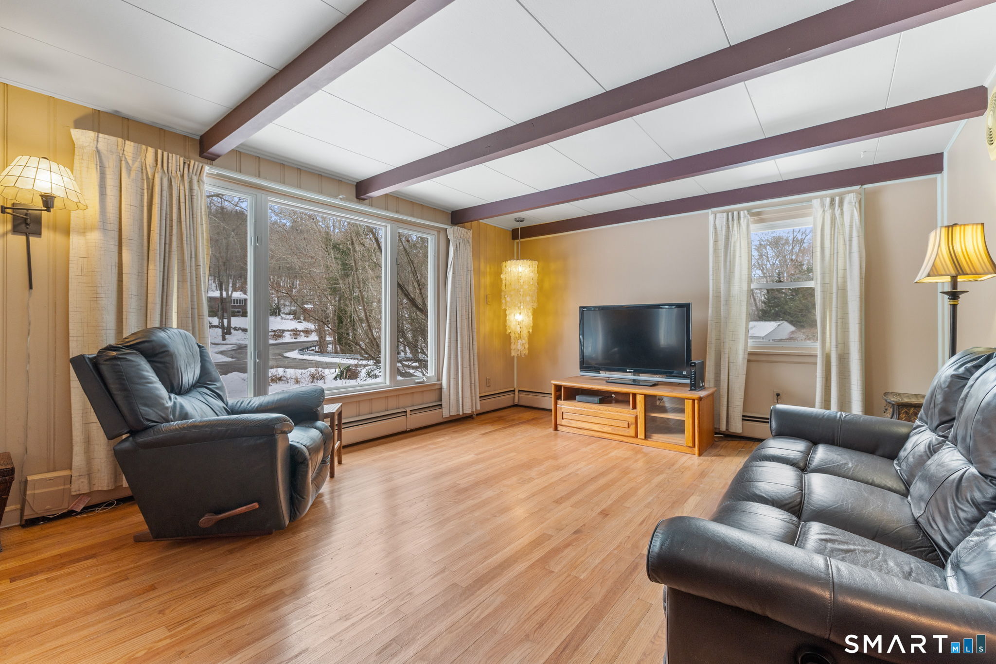 52 North Glenwoods Road Ledyard, CT 06335 - Photo 4 of 27 a living room with furniture and a flat screen tv
