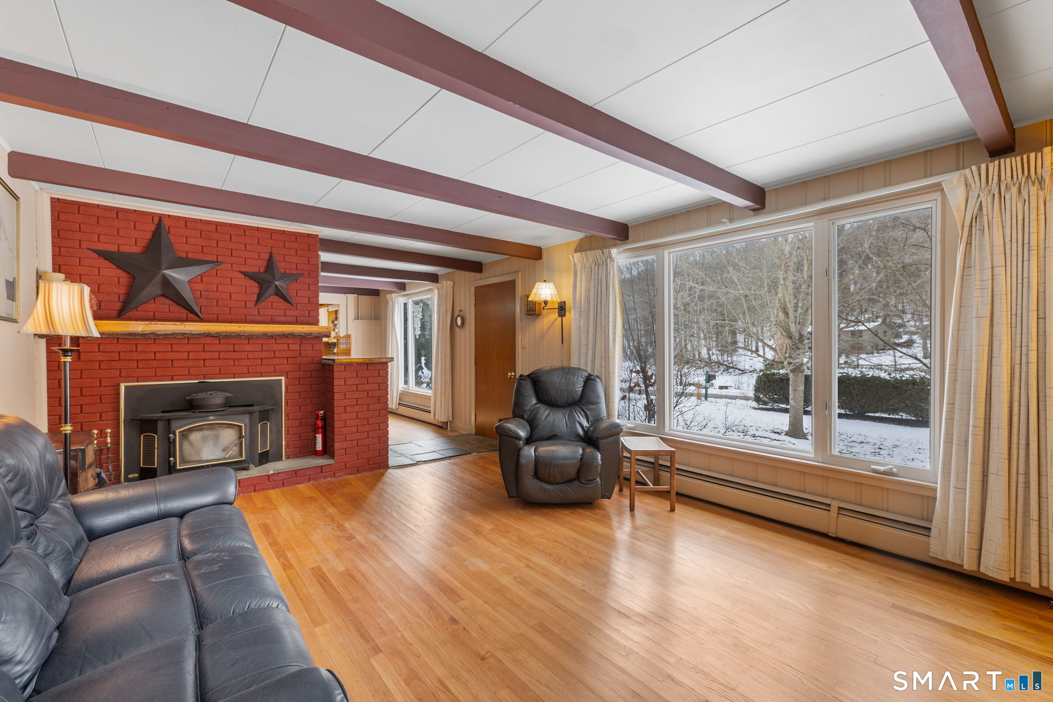 52 North Glenwoods Road Ledyard, CT 06335 - Photo 5 of 27 a living room with furniture and a fireplace