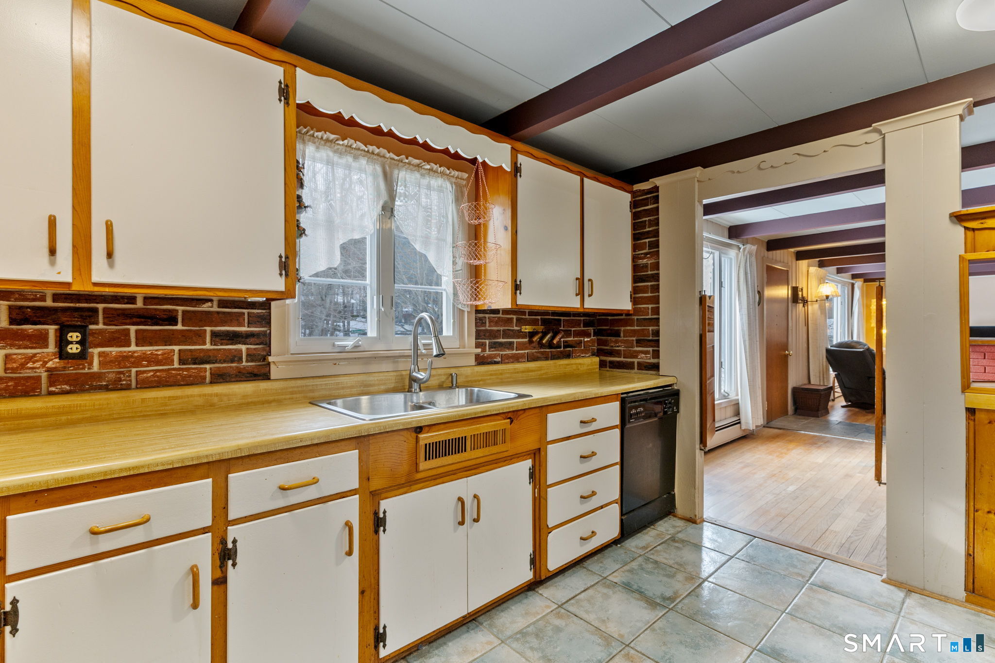 52 North Glenwoods Road Ledyard, CT 06335 - Photo 10 of 27 a kitchen with stainless steel appliances granite countertop a sink and cabinets