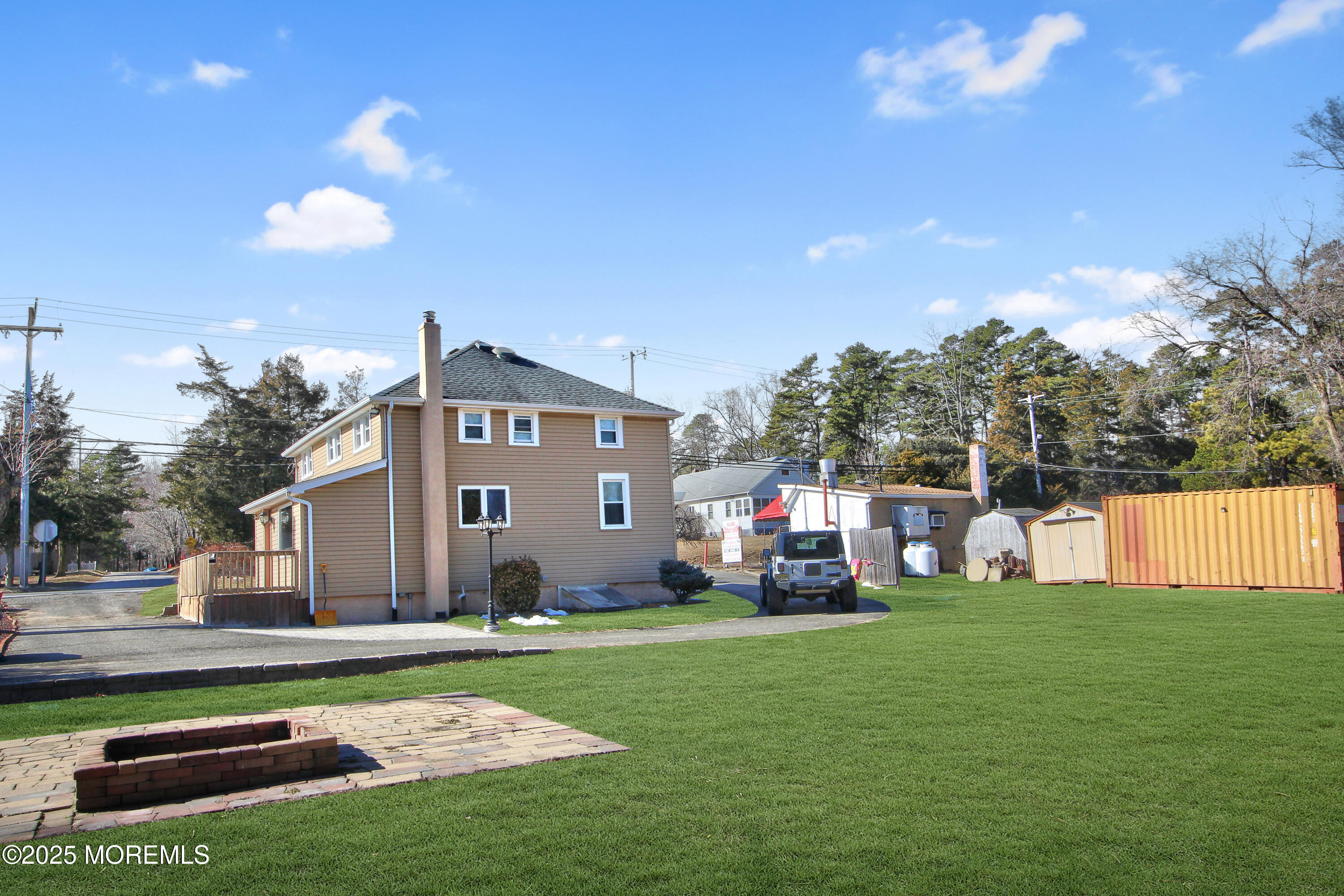 Cassville Road Jackson, NJ 08527 - Photo 15 of 22 a front view of a house with garden and trees