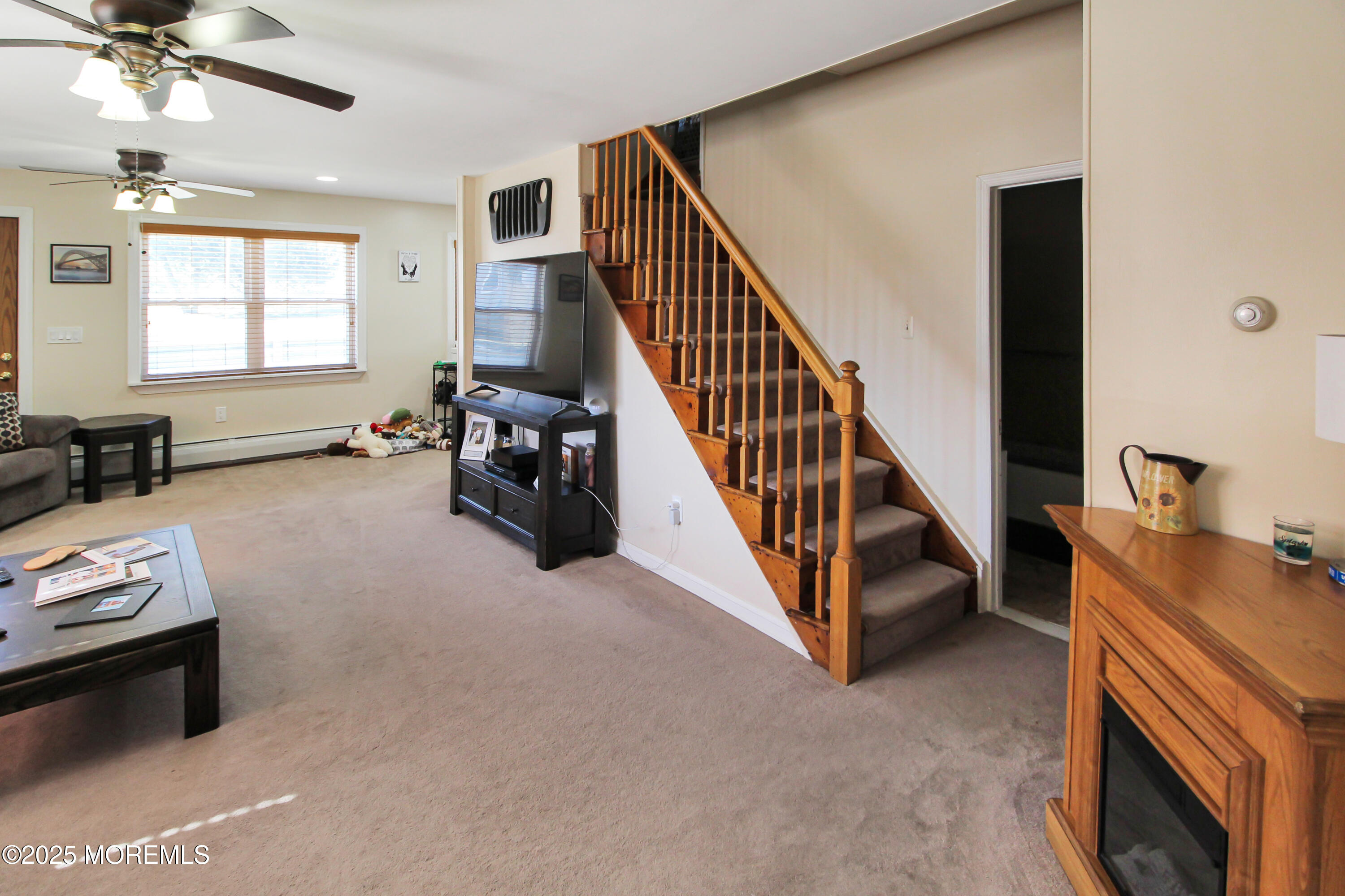 Cassville Road Jackson, NJ 08527 - Photo 7 of 22 a room with furniture and a wooden floor
