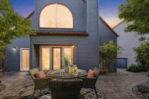 a view of house with outdoor seating space