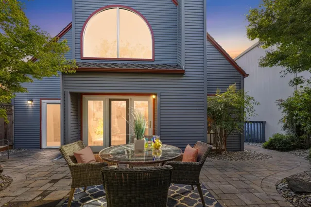 a view of house with outdoor seating space