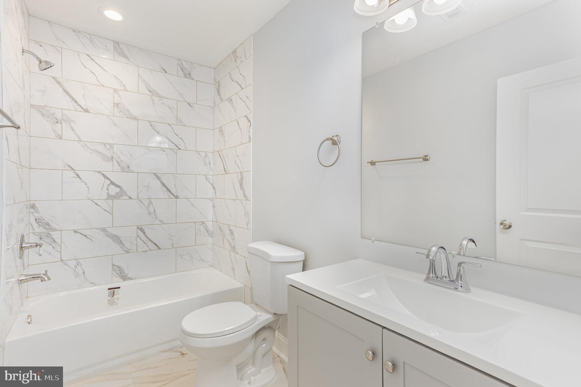 2430 Harris Mill Road Parkton, MD 21120 - Photo 51 of 68 a bathroom with a sink a toilet and shower