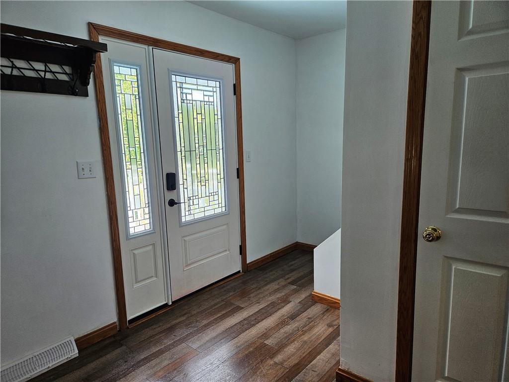7715 Lamor Road Mercer, PA 16137 - Photo 2 of 30 a view of an entryway with wooden floor