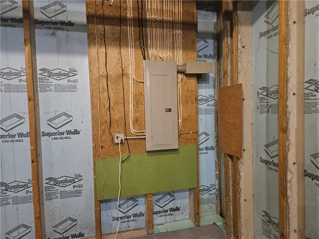 a bathroom with a shower and a sink