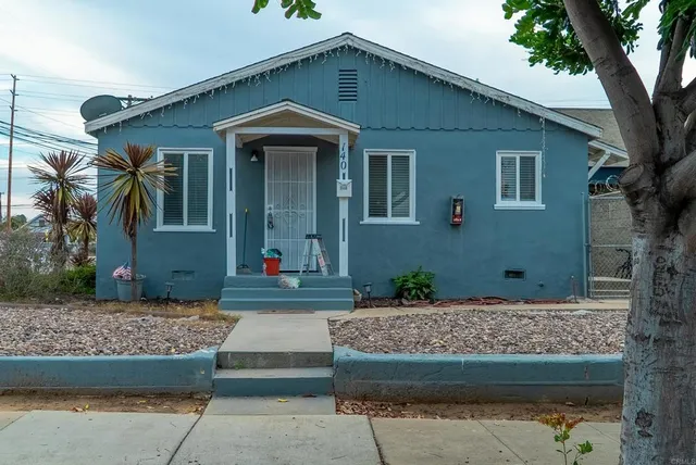 a front view of a house with garage