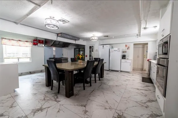 a view of a dining room with furniture