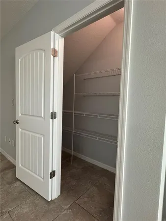 an empty room with closet