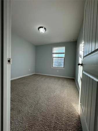 a bathroom with a bathtub a toilet a sink and mirror