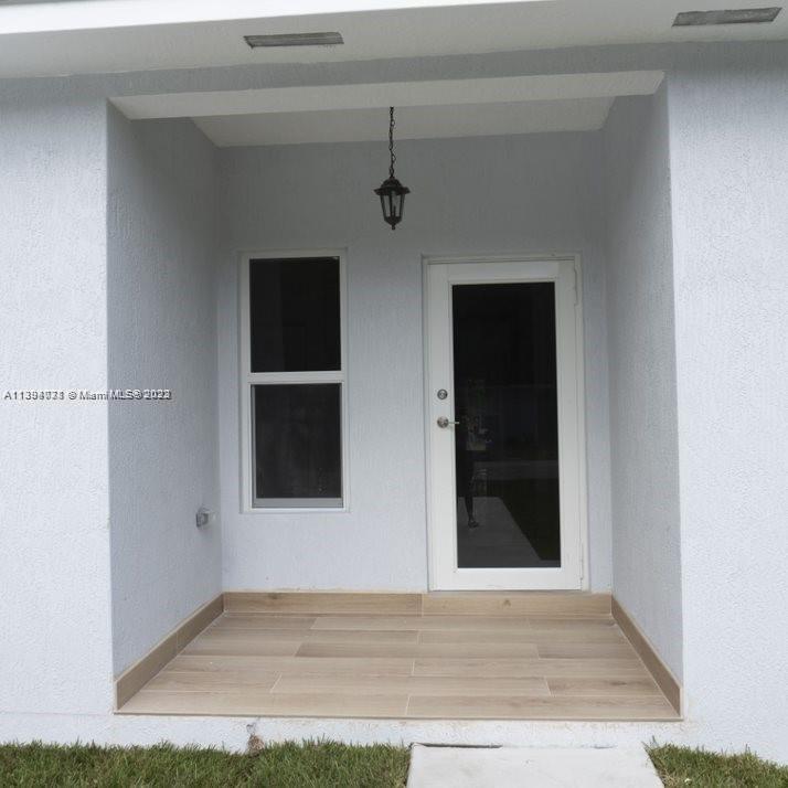 Blanche Ely Pompano Beach, FL 33060 - Photo 7 of 24 a view of front door