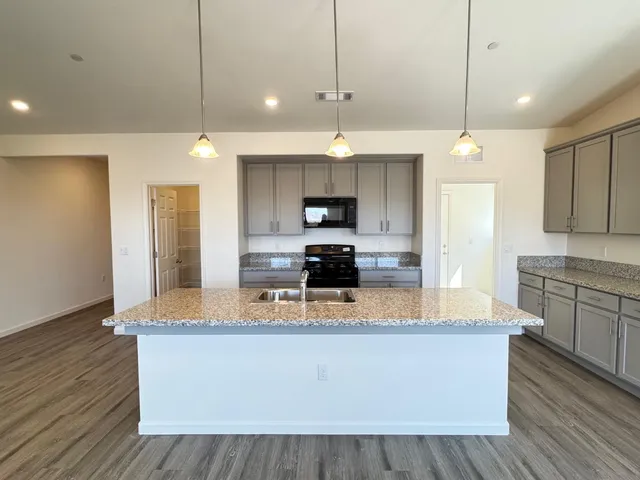 a large kitchen island with a large island in the center