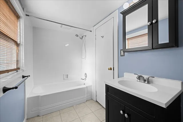 a bathroom with a sink and a bathtub