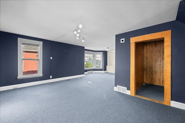 a view of a livingroom with a fireplace