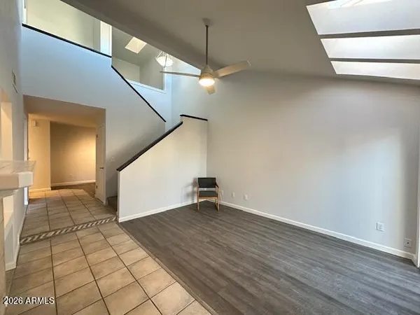 a view of a house with backyard outdoor seating area and furniture