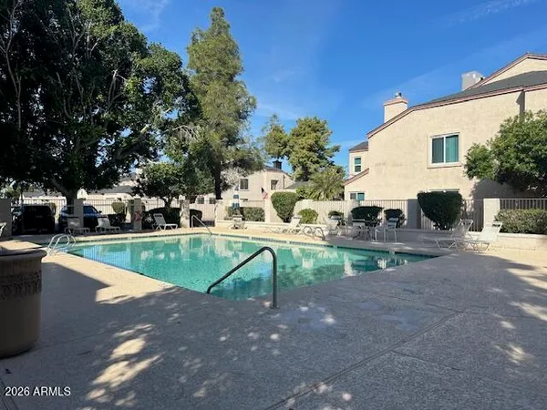 a view of city street with a ocean view