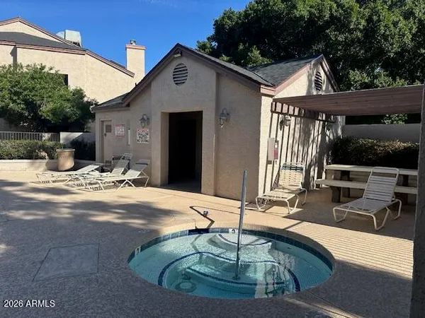 a view of a livingroom with an empty space and a fireplace