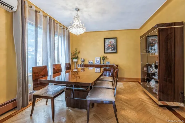 a view of a dining room with furniture and window