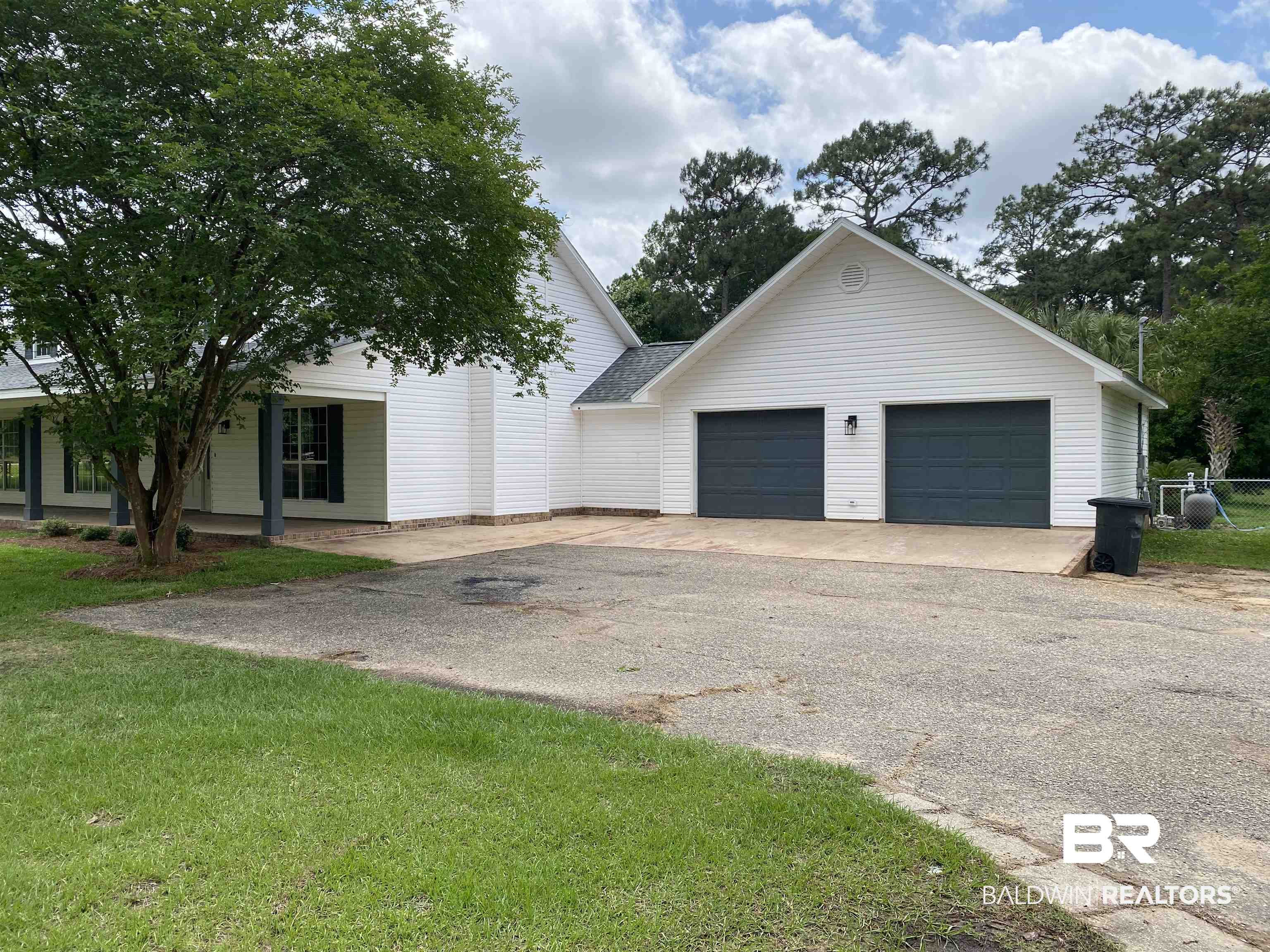 12150 Lee Bishop Road Irvington, AL 36544 - Photo 2 of 26 Exterior space with a lawn