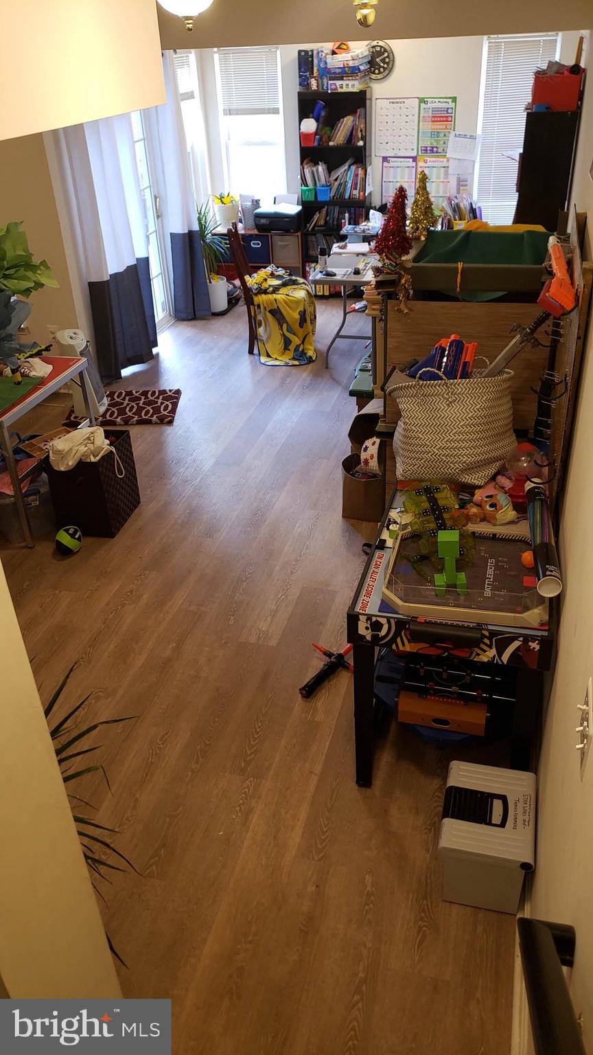 9841 Cheshire Ridge Circle Manassas, VA 20110 - Photo 21 of 29 basement (excuse the clutter) with fireplace