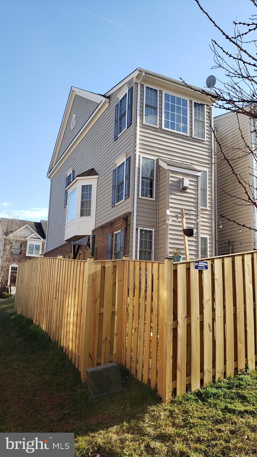 9841 Cheshire Ridge Circle Manassas, VA 20110 - Photo 25 of 29 Newer fence and view of 3 level bump out