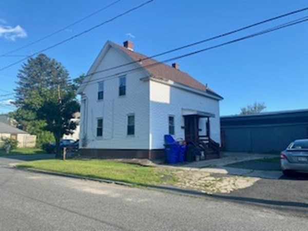 22-24 Cedar Street Springfield, MA 01151 - Photo 4 of 22 a view of a house with a patio
