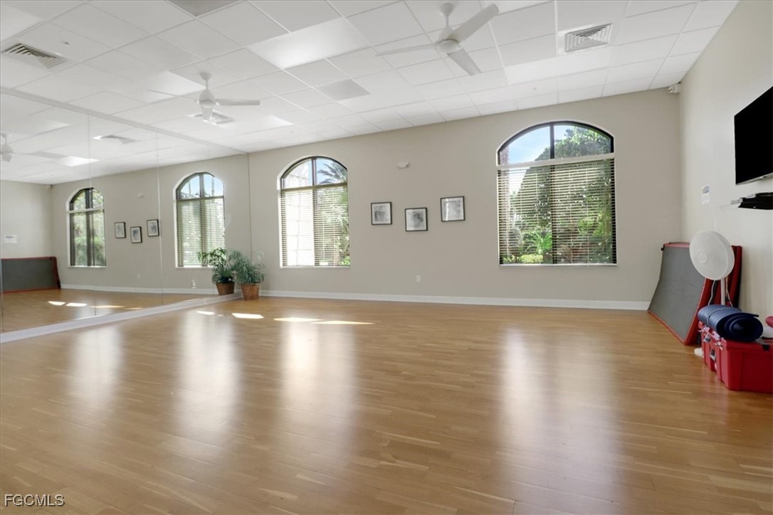 19674 Villa Rosa Loop Estero, FL 33967 - Photo 26 of 33 a view of a living room and hardwood floor