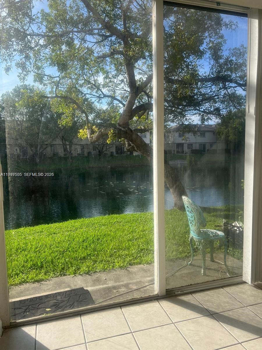 969 Abaco Lane Riviera Beach, FL 33404 - Photo 10 of 11 a view of a lake view