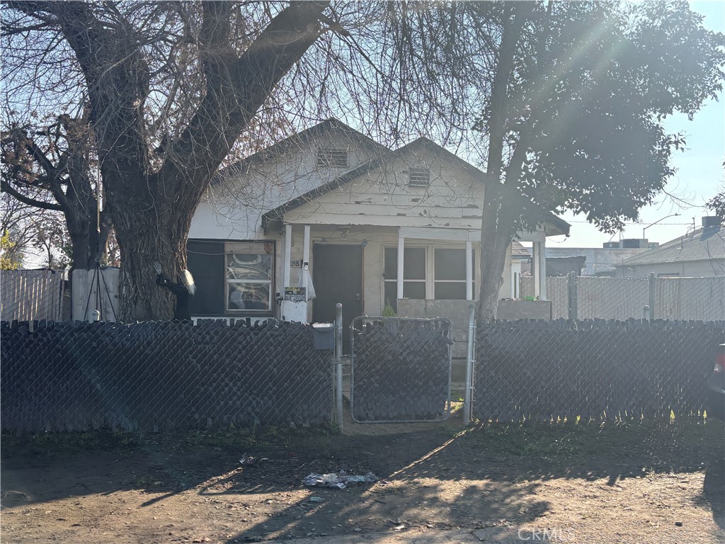 2148 Keely Avenue Merced, CA 95340 - Photo 3 of 4 a front view of a house with a yard