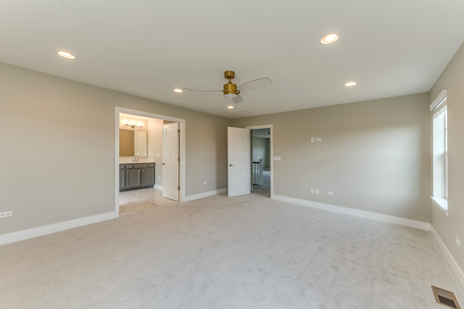 13101 Kettering Way Lemont, IL 60439 - Photo 25 of 36 an empty room with windows and pillars in it