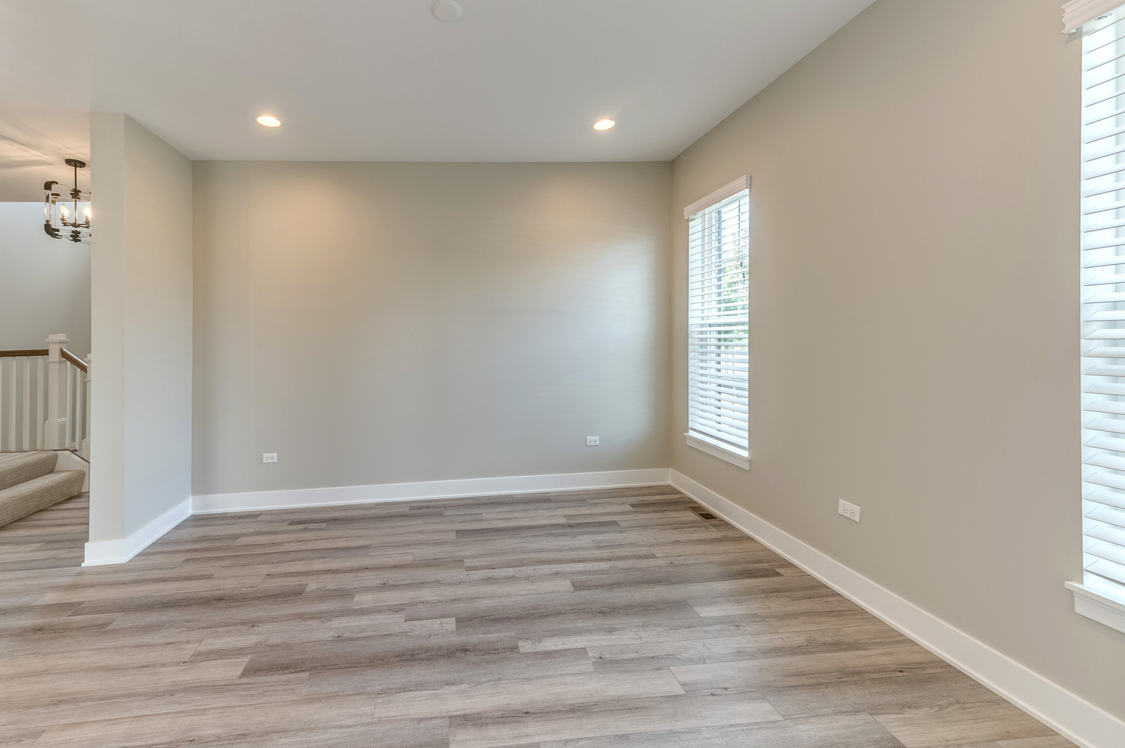13101 Kettering Way Lemont, IL 60439 - Photo 9 of 36 wooden floor in an empty room with a window