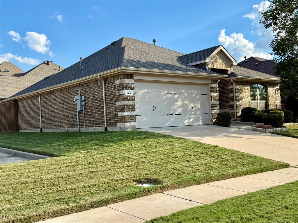 204 Tower Circle Terrell, TX 75160 - Photo 26 of 35 a front view of a house with a yard