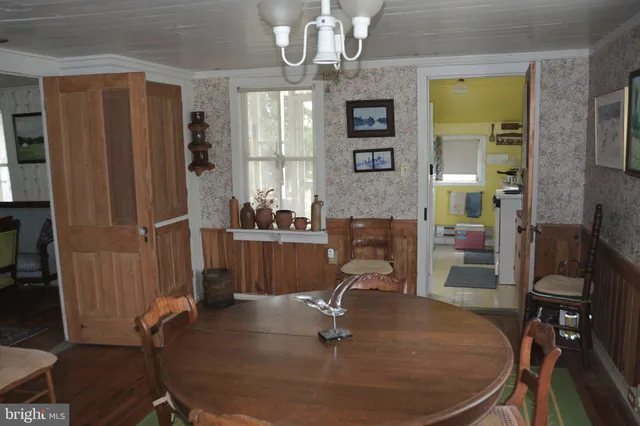 a room with furniture and gym equipment