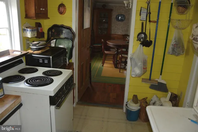 a bedroom with a bed and a table