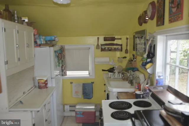 a bathroom with a toilet and a sink