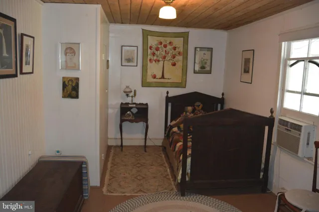 a living room with lots of furniture and a fireplace