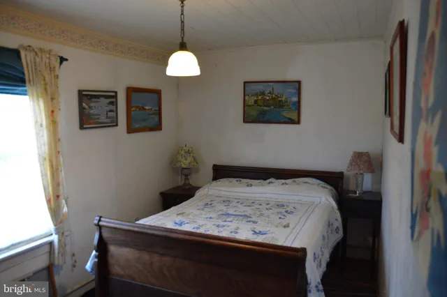 a sitting area with furniture and a rug