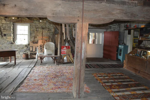 a view of a balcony and chairs