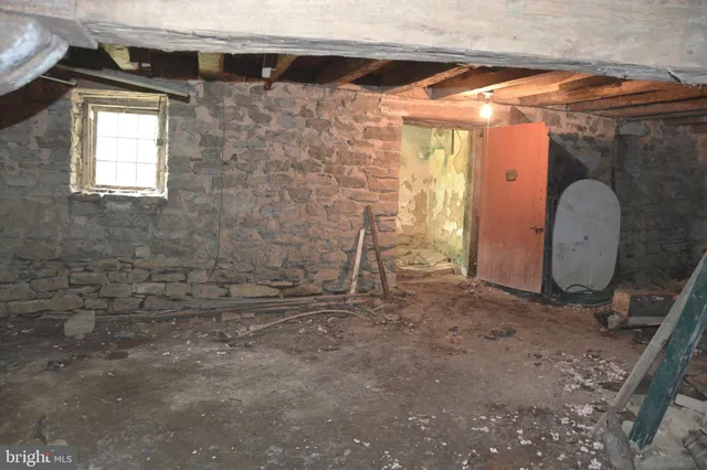 a view of a swimming pool with a house in the background