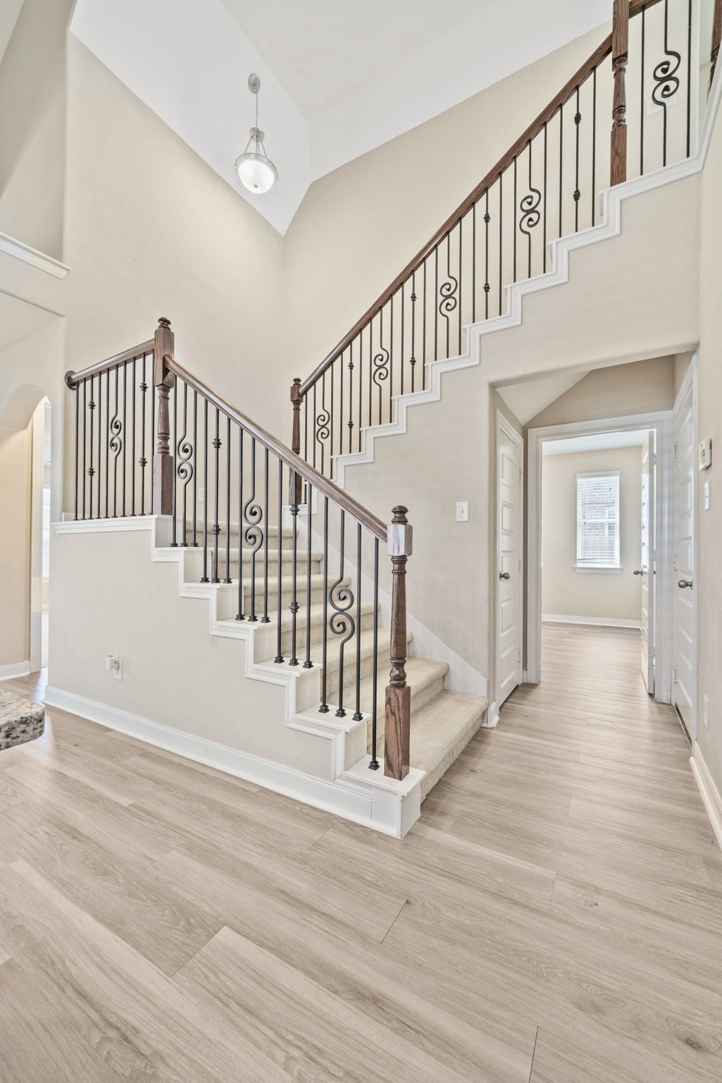 22523 Birch Ridge Meadow Drive Spring, TX 77389 - Photo 13 of 39 a view of staircase with white walls and a window