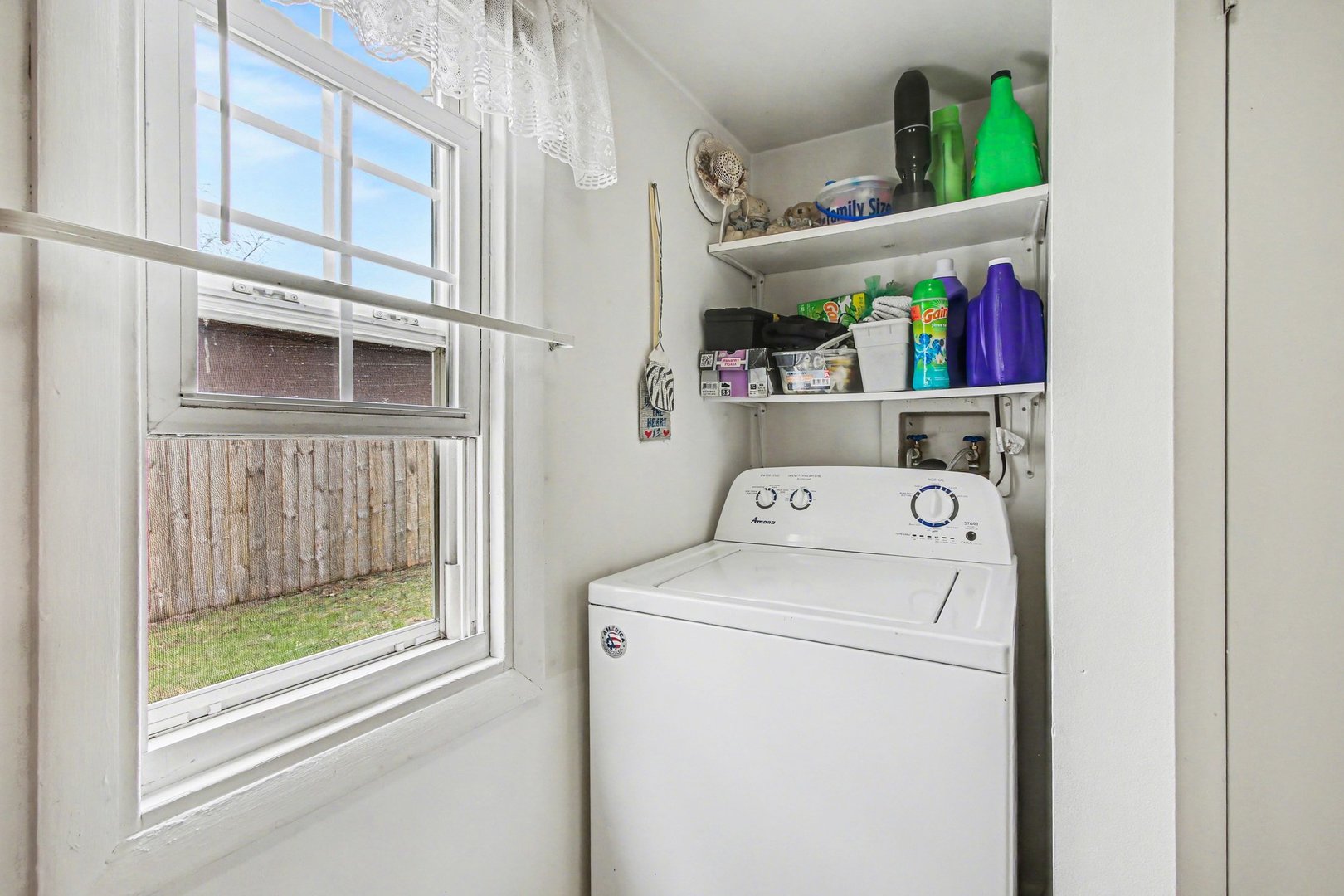 5335 Stone Avenue Portage, IN 46368 - Photo 13 of 17 a view of storage and utility room with washer and dryer