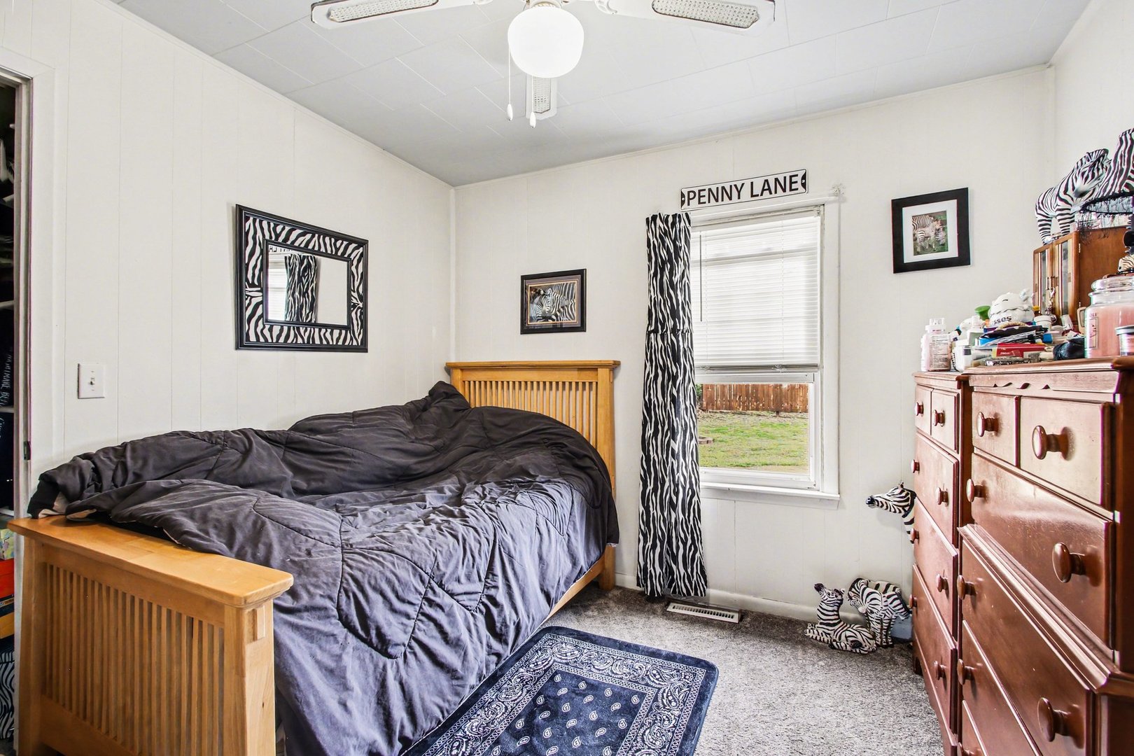 5335 Stone Avenue Portage, IN 46368 - Photo 10 of 17 a bedroom with a bed and a window