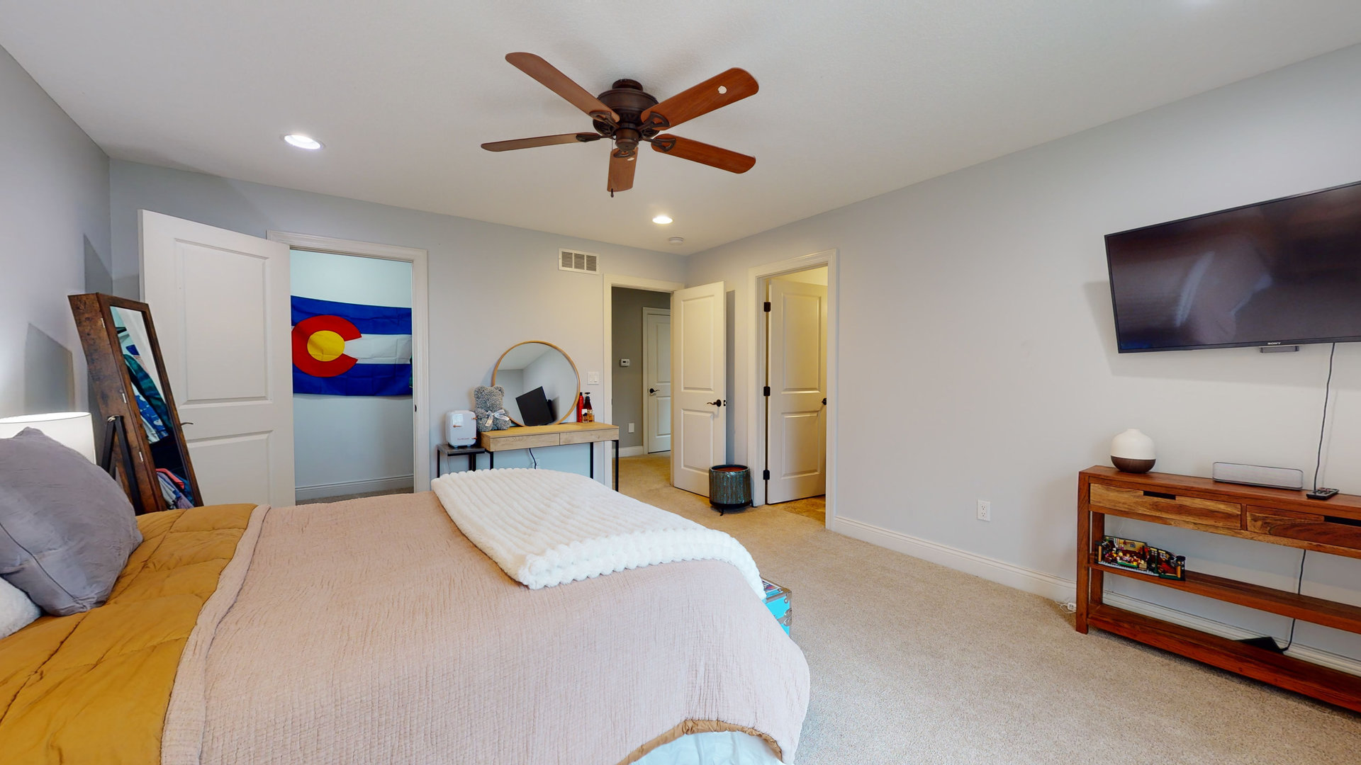 1303 East White Oak Road Mahomet, IL 61853 - Photo 24 of 64 a bed room with a bed and a flat screen tv