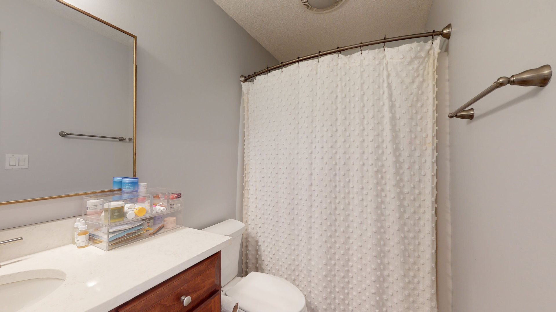 1303 East White Oak Road Mahomet, IL 61853 - Photo 25 of 64 a bathroom with a sink and a mirror