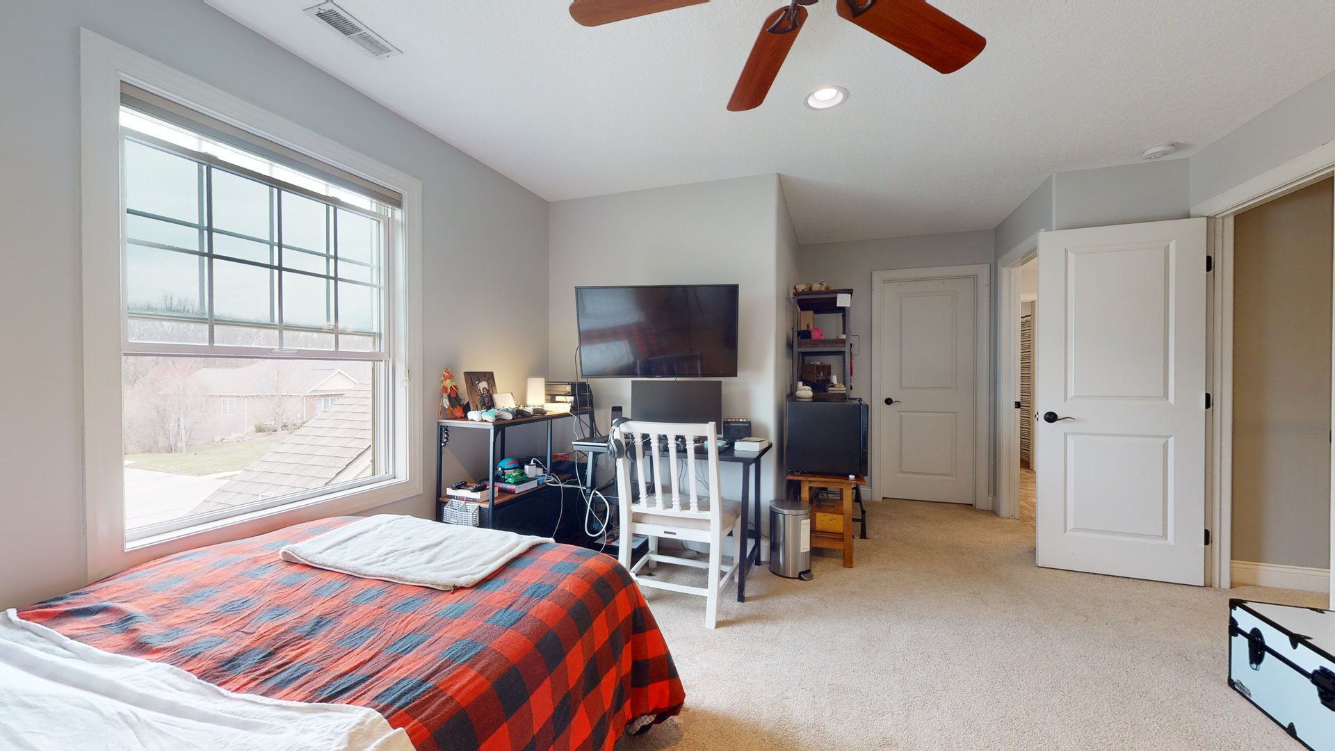 1303 East White Oak Road Mahomet, IL 61853 - Photo 27 of 64 a bedroom with a bed and a large window