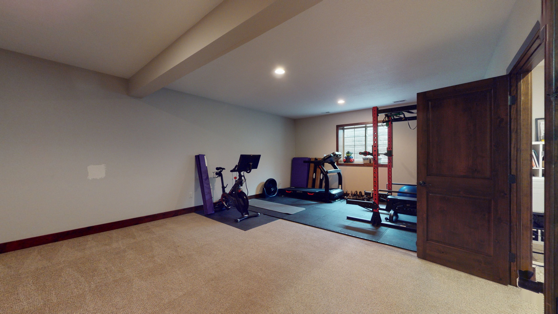 1303 East White Oak Road Mahomet, IL 61853 - Photo 39 of 64 a view of a room with gym equipment