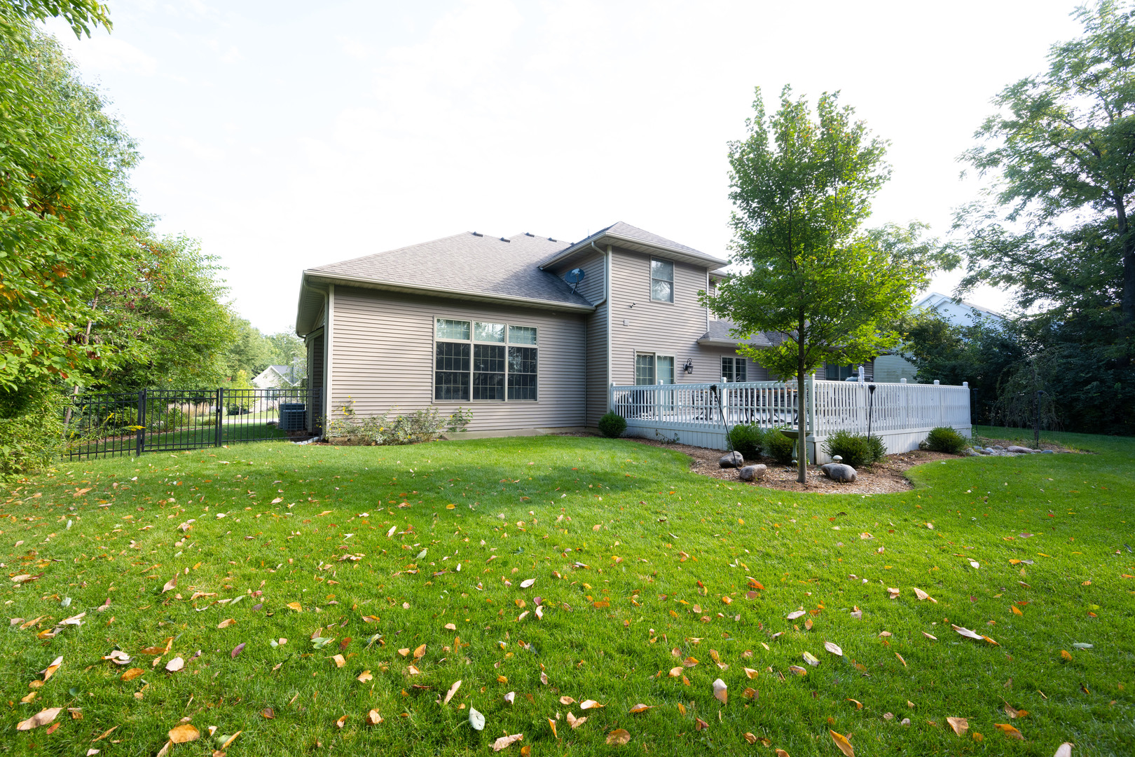 1303 East White Oak Road Mahomet, IL 61853 - Photo 53 of 64 a view of a house with backyard and sitting area