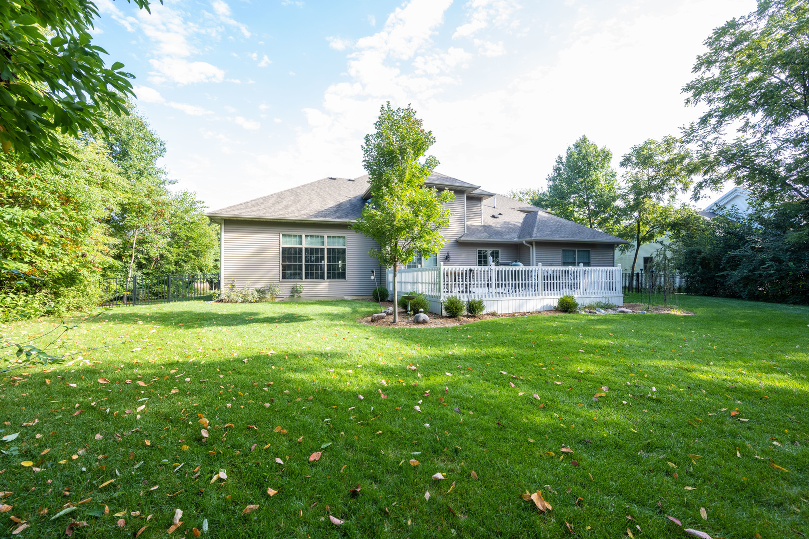 1303 East White Oak Road Mahomet, IL 61853 - Photo 54 of 64 a front view of house with yard and green space