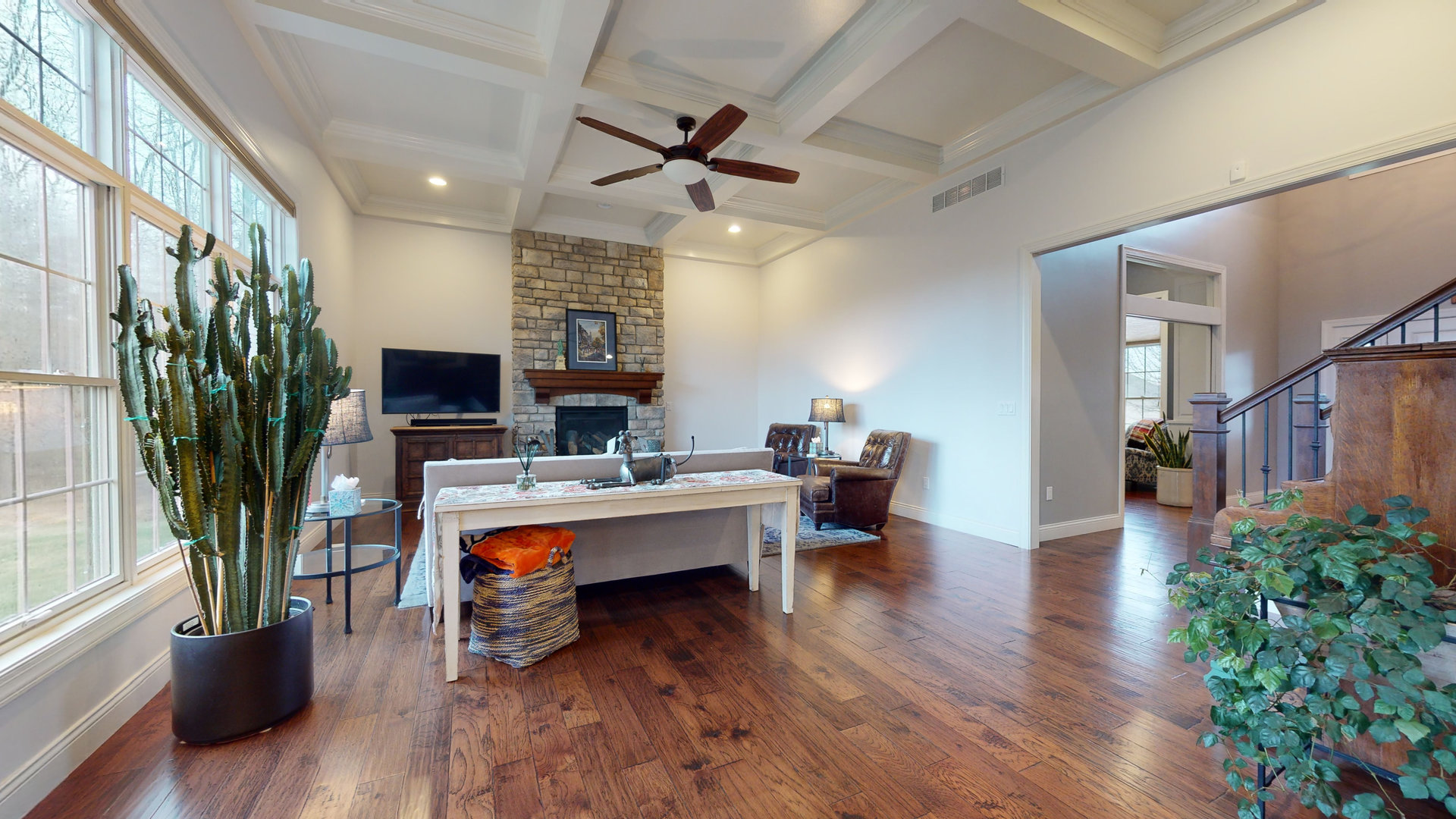 1303 East White Oak Road Mahomet, IL 61853 - Photo 6 of 64 a view of a workspace with furniture window and wooden floor