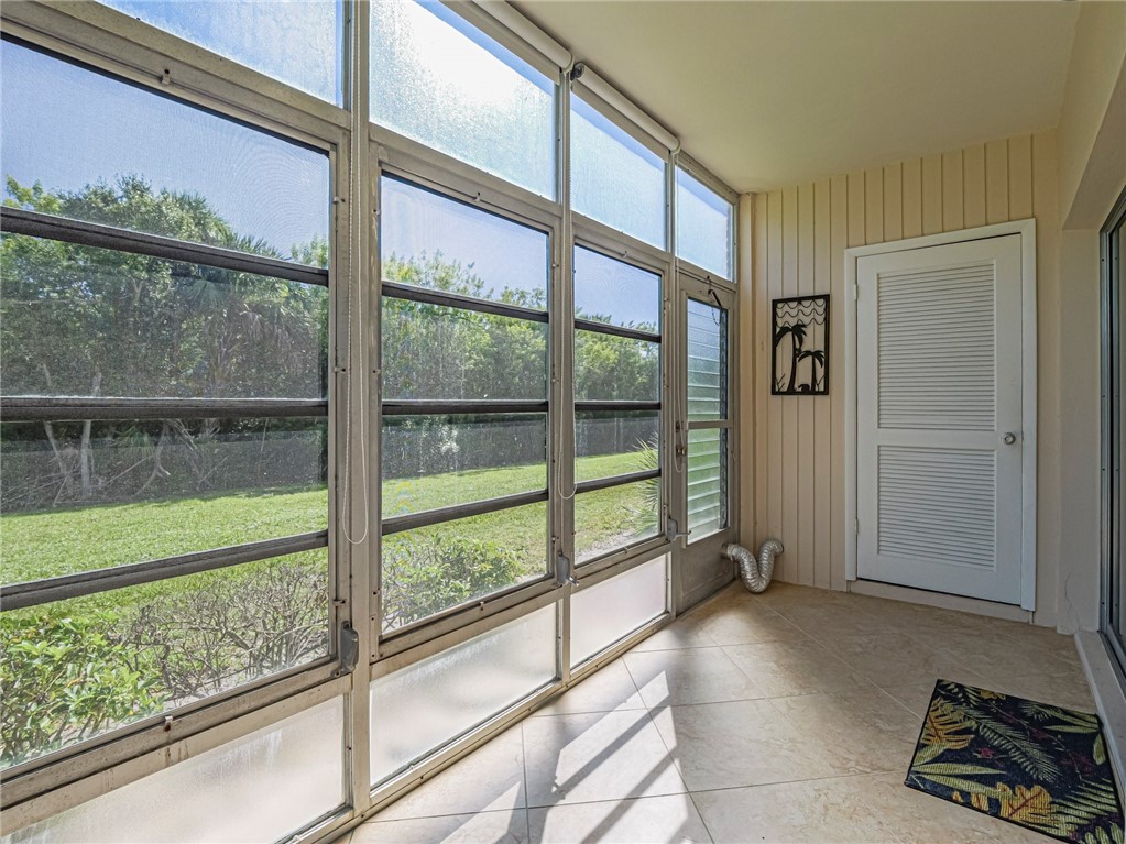 110 Spring Lake Court, Unit 102 Vero Beach, FL 32962 - Photo 27 of 33 a view of front door